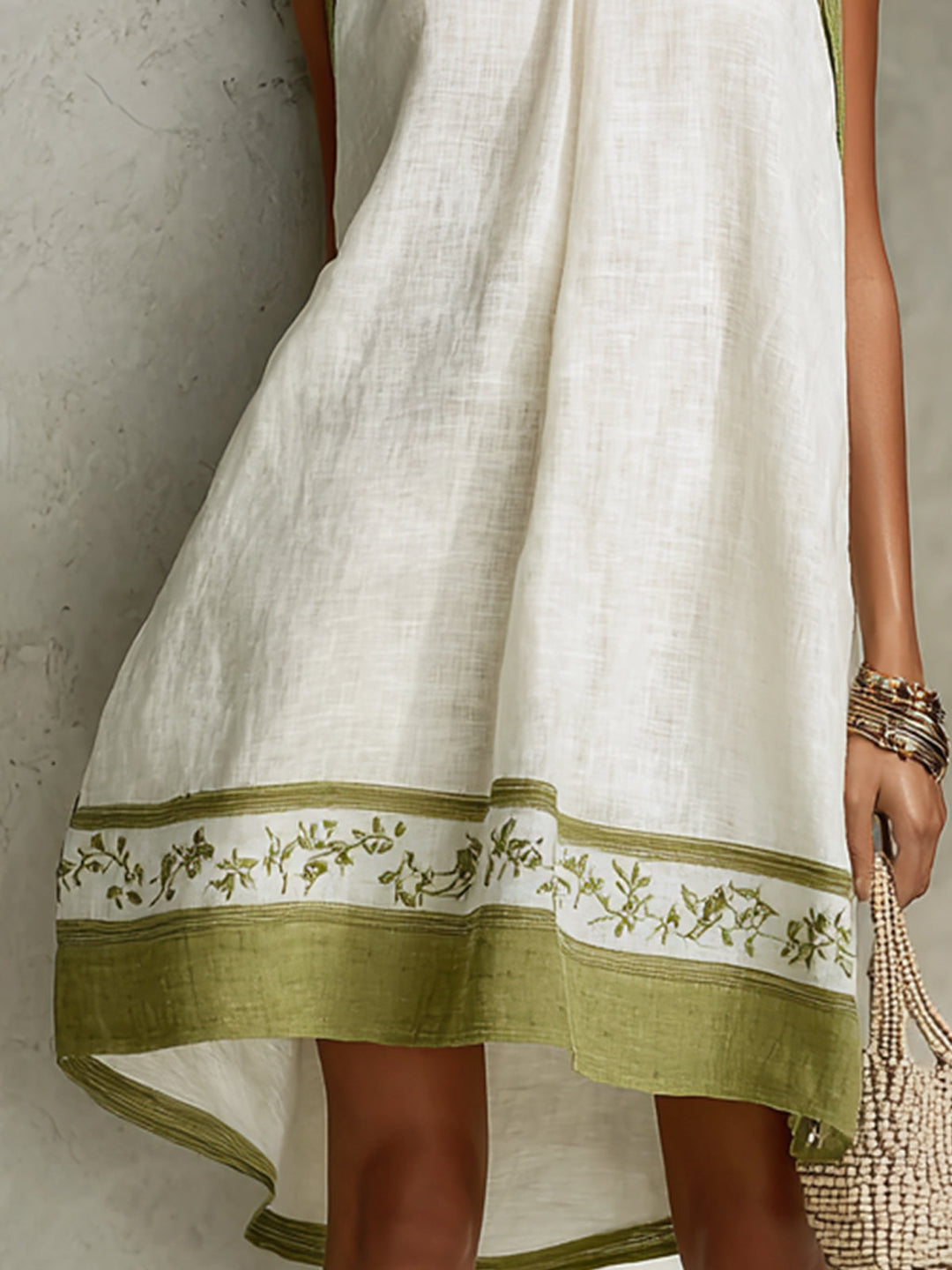 Elle | Sleeveless Floral Trapeze Mini Dress in White and Olive Green